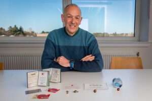 Martin Cockcroft pictured sitting at a table